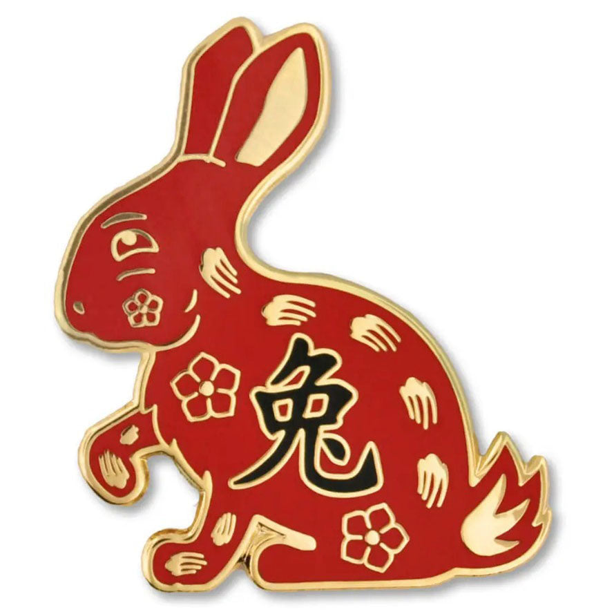 Red and gold Rabbit Zodiac pin with Chinese characters on a white background