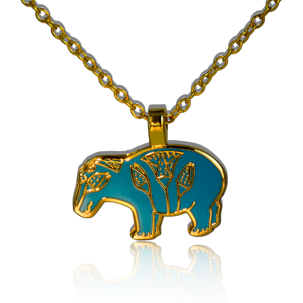 Turquoise and gold Egyptian-style enamel hippo pendant on gold chain on white background.