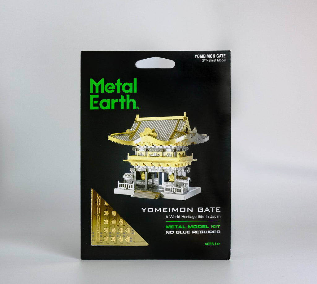 Black activity kit with green text "metal earth," silver and gold Yomeimon gate in center. On white background. 